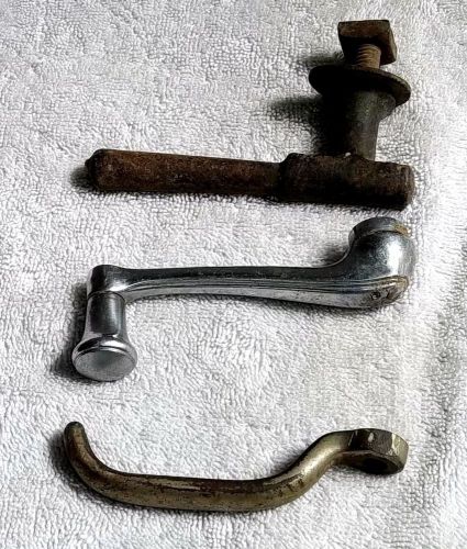 3 antique (1) auto window riser handle and (2) door handles one of cast iron