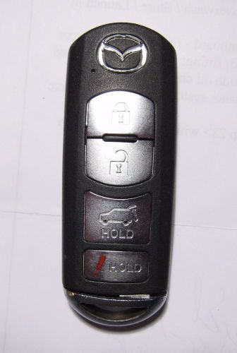 Mazda smart key remote fcc #  wazx1t763ske11a04     ... free ship