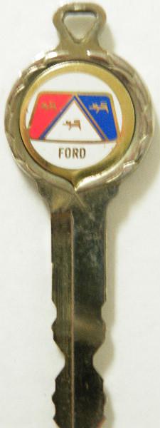 Vintage ford gold plated key w/emblem