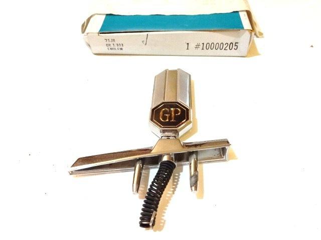 Nos hood ornament assembly 1978-1980 grand prix, still in the old gm box!