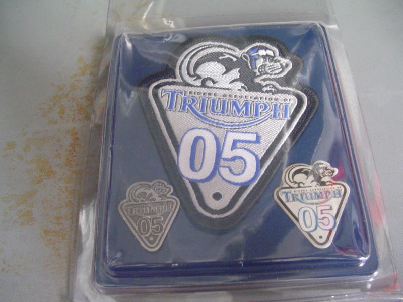 Triumph cloth sew on badge and pins set--new---no reserve! 
