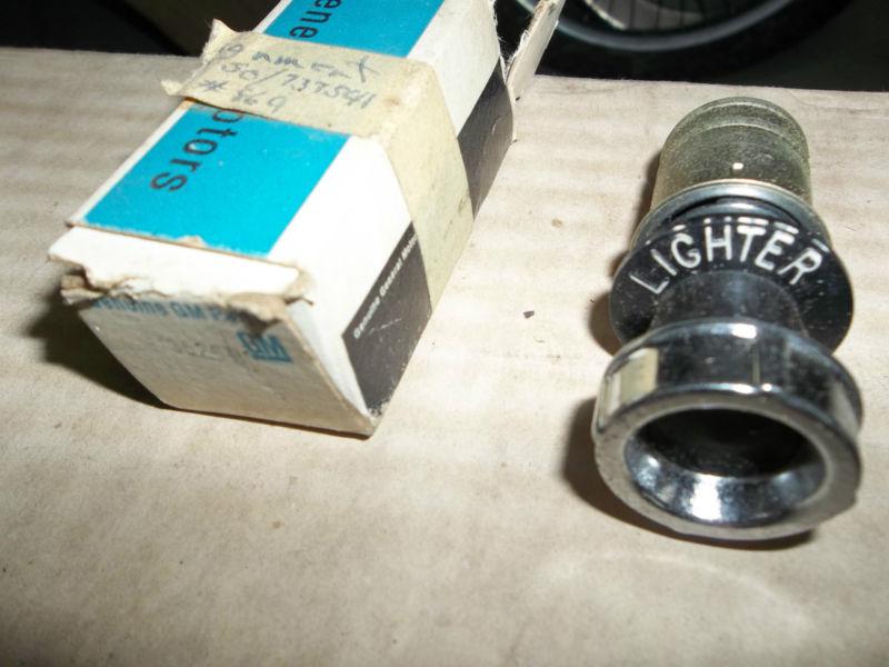 57 chevolet belair corvette cigarette  lighter nos in box  chevrolet  