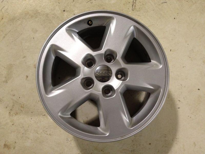 17" jeep grand cherokee wheel. factory oem 2011 2012 2013 silver rim. 11 12 13