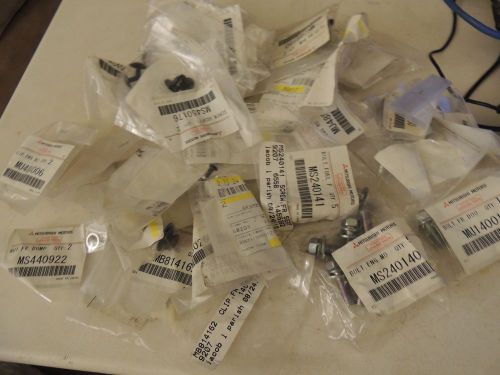 Lot of assorted oem new mitsubishi fasteners multiple part #s