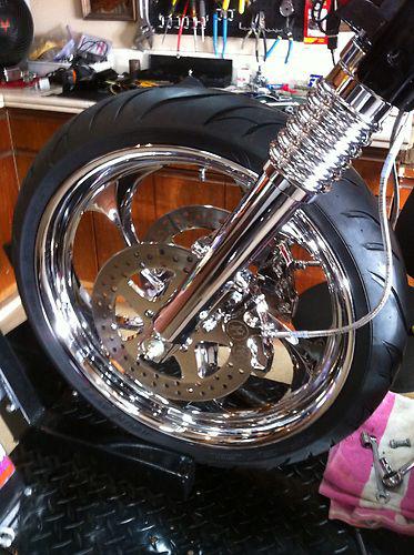 21" chrome renegade front wheel with dual rotors and avon tire