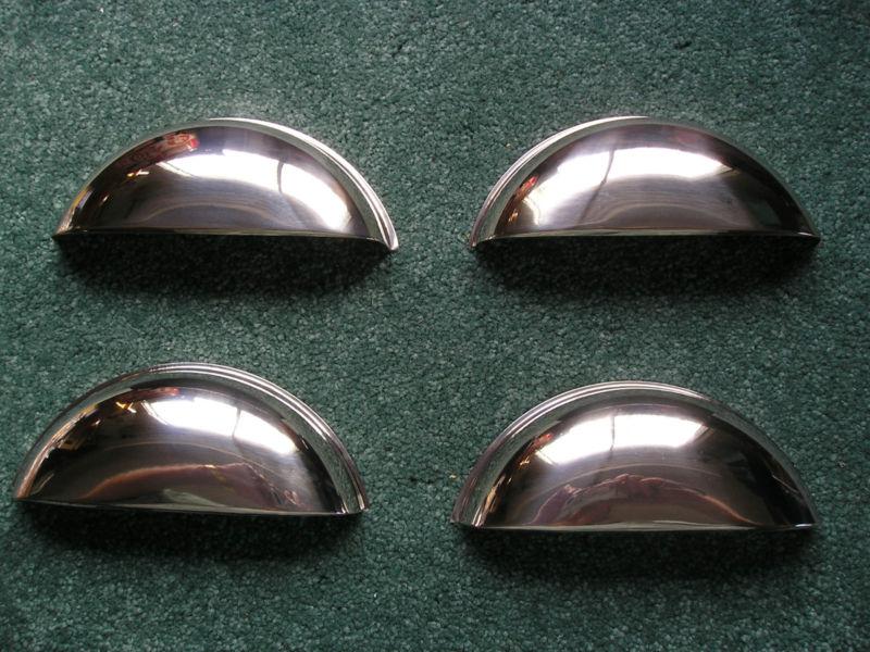 1958 to 1976 headlight shields or half moon covers. 