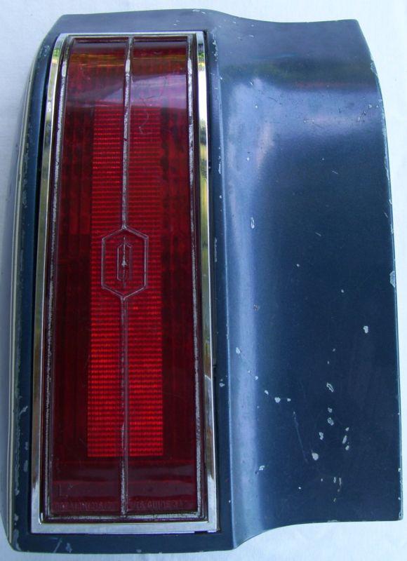 1976 oldsmobile cutlass left tail light quarter panel assembly