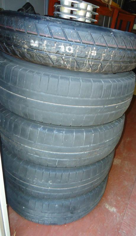Set of 4 used rims and tires for 2010 jeep patriot