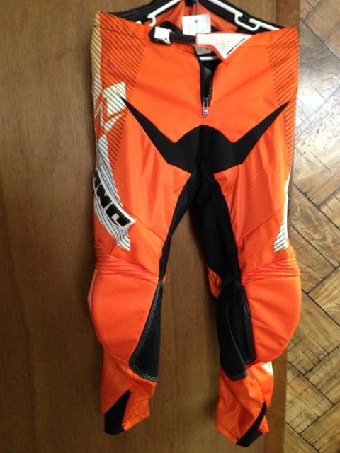 Jnc off road orange and black riding pants size 34w part # 334230