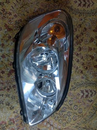 06-11 buick lucerne headlight headlamp passenger side right rh
