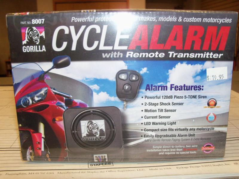 Brand new/unopened gorilla cycle alarm with remote transmitter.