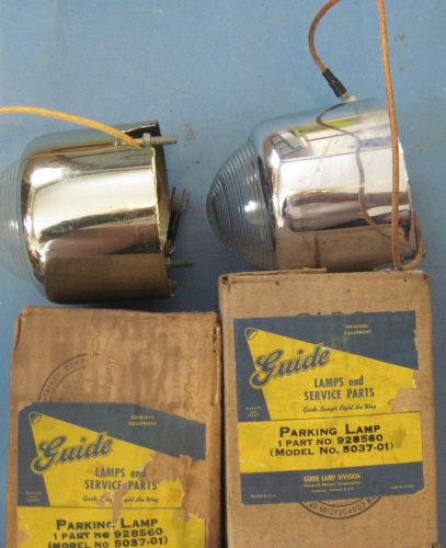 0nos pair of parking light assemblies 1950 chevrolet in guide boxes