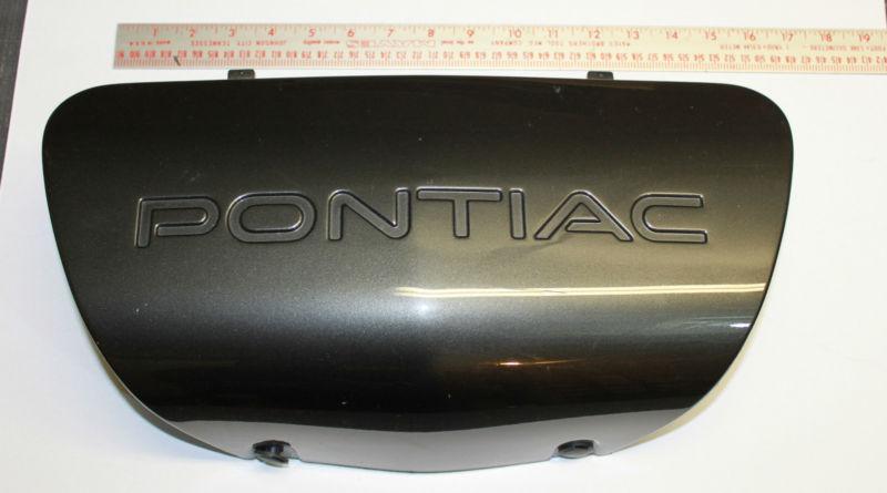 97-04 pontiac oem front bumper license plate insert / cover
