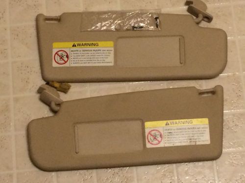 98-05 vw jetta sun visors tan with screws and covers (fits:2001 jetta)