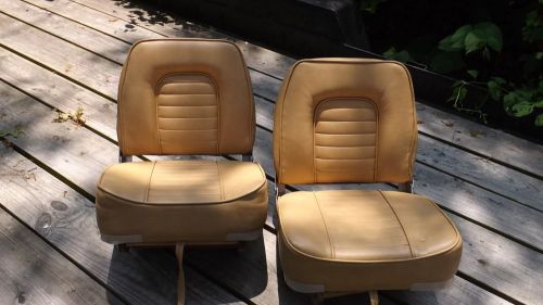 Two boat seats swivel &amp; fold tan/beige good condition