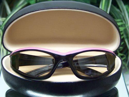 ladies pink and black  transition lens clear to dark  motorcycle sunglasses 