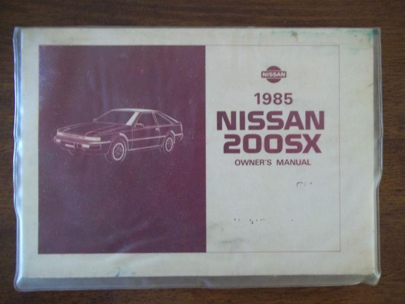 1985 nissan 200sx owner's manual with original warrenty and plastic sleeve