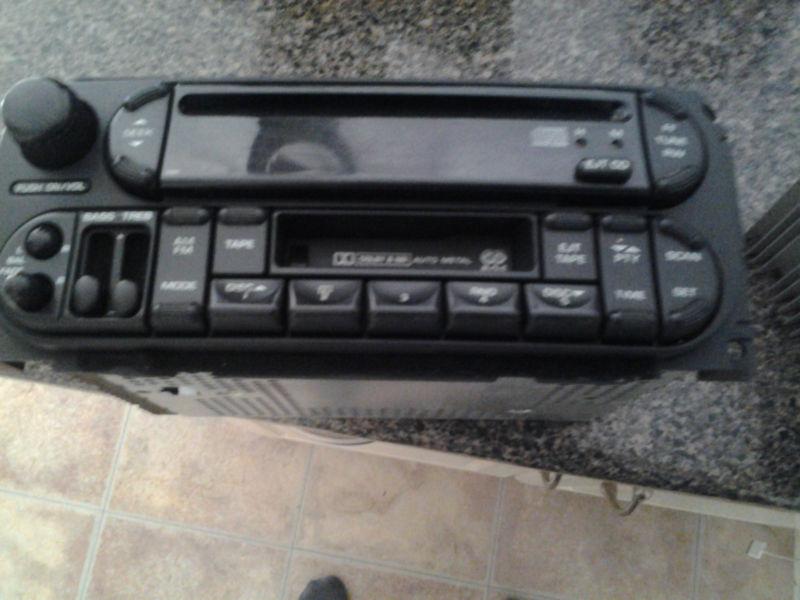 Dodge , jeep , chrysler radio cd player and cassette tape new style one grey plu