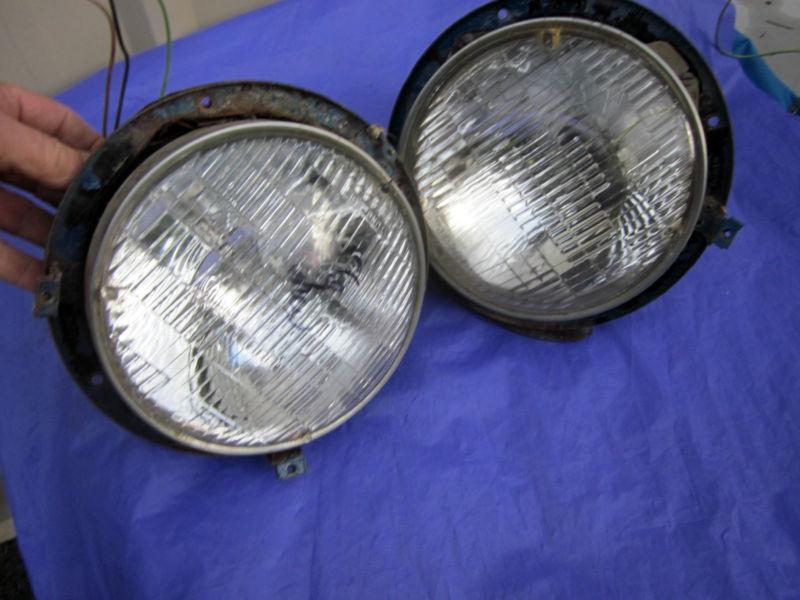 1956  chevrolet buick headlight buckets complete with wiring good condition pair