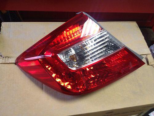 2012 oem driver side civic tail lamp 4 door brand new.