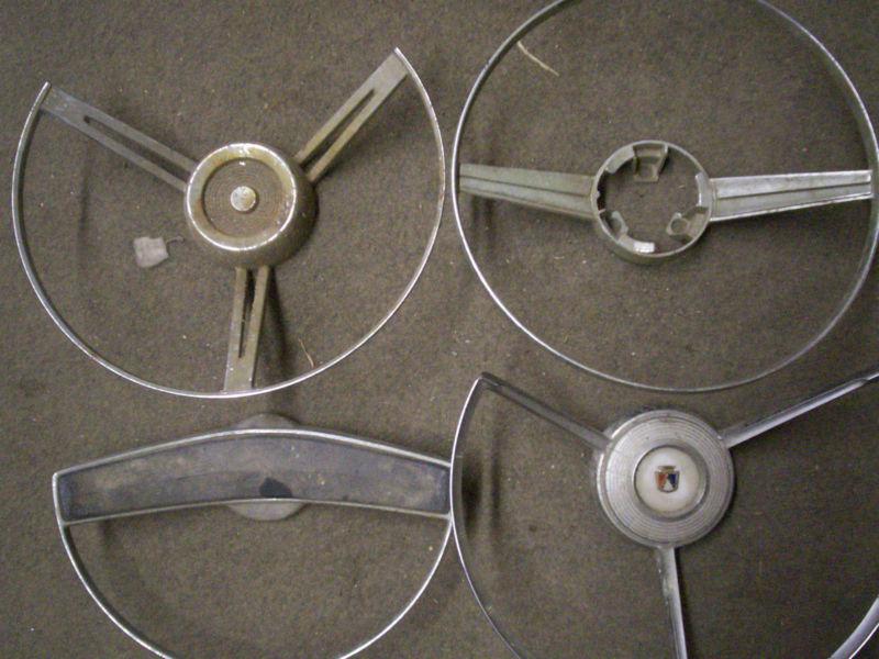 Four vintage horn rings