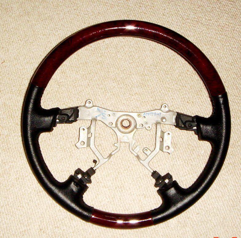 Oem toyota tacoma wood & black leather steering wheel 
