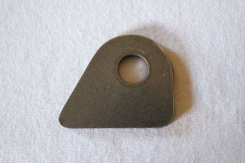 Low profile triangle shock/suspension or belt tab