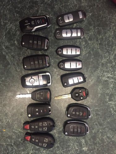 Dealer locksmith part lot 16 remote key fobs hyundia kia nissan ford mazda oem