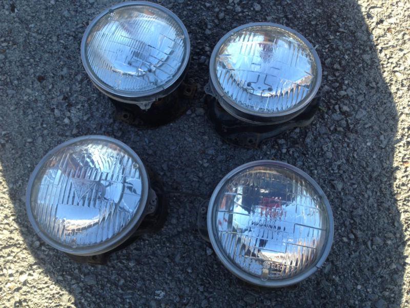 68 olds cutlass 442 f85 vista headlight buckets - original metal set of 4