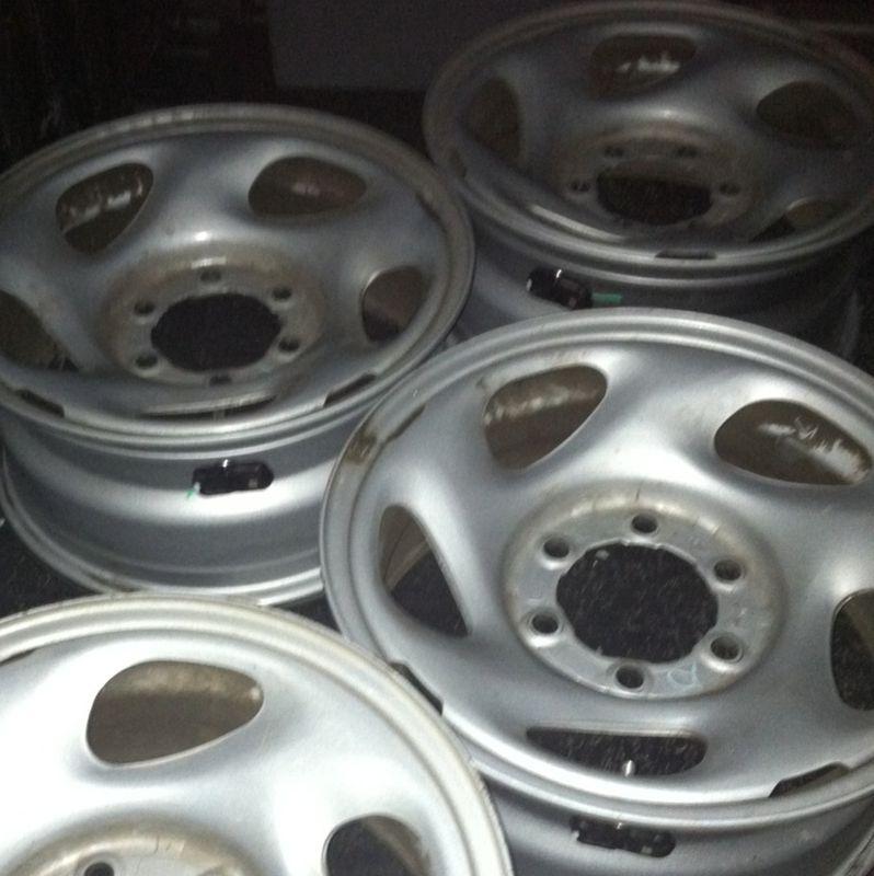 Set of 4 16 inch toyota sr5 wheels