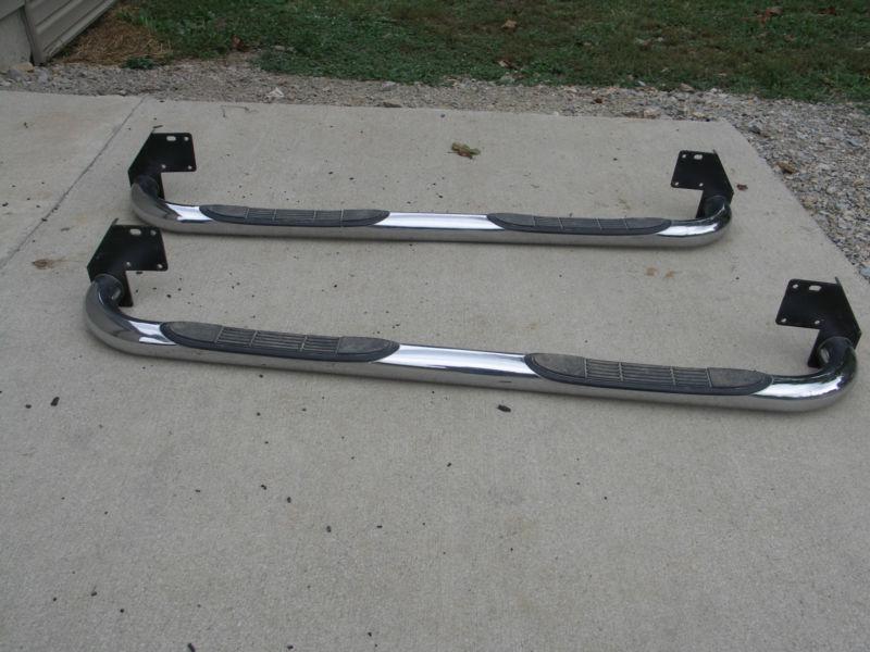 Chrome nerf bars from a 2000 ford f250 extended cab truck running boards used