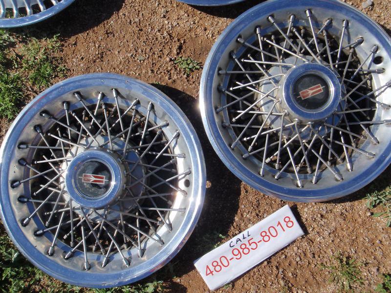 79 80 81 82 oldsmobile cutlass hubcap wheel cover 14" used 4057 oem rim cap wire