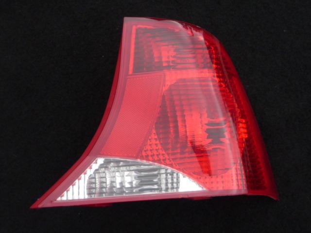 Taillight (lens & housing) assembly genuine ford product (2000-2004) back of car