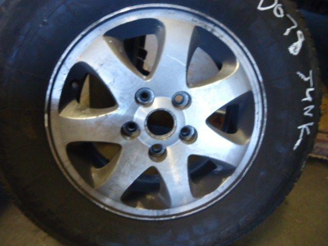04 05 sedona wheel 15x6 alloy 7 spoke