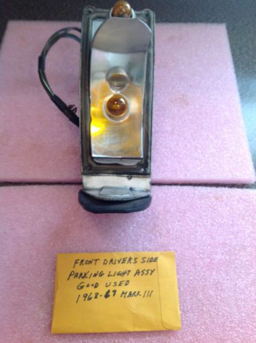 One good used front drivers side parking light assy for 1968-69 mark iii