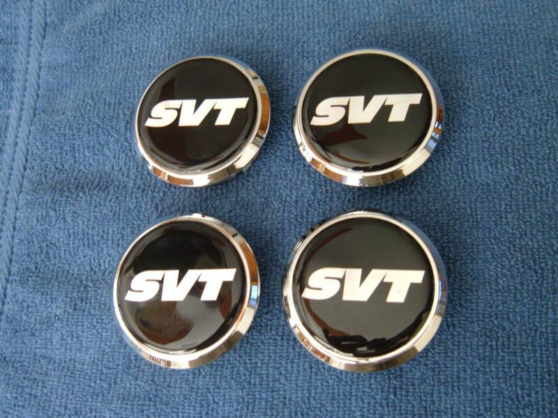 2005-2014 mustang gt or v6 - set of 4 svt center caps - good used condition