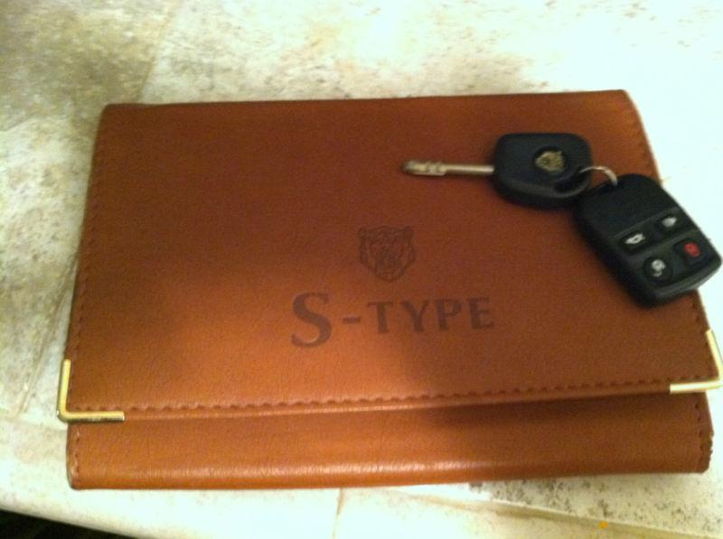 Beautiful 2000 jaguar s-type manual set, leather case with key and remote