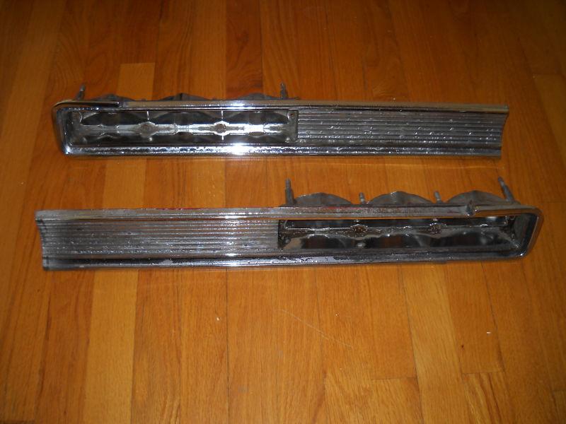 A used pair of 1964 pontiac gto/lemans/tempest rear tail light housings
