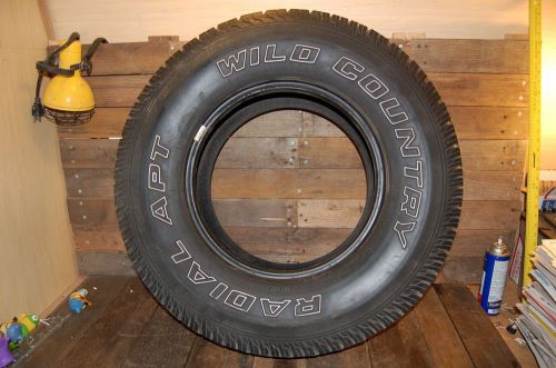 Wild country 265/ 75/16 tire radial apt p265/75/r16 good tread used tire