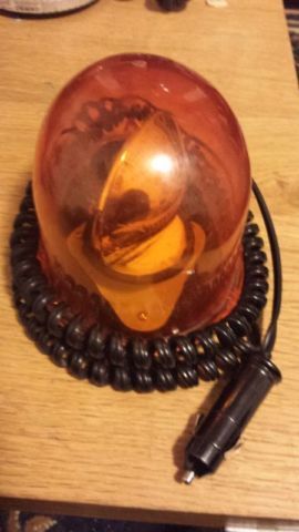 Teardrop amber rotating light