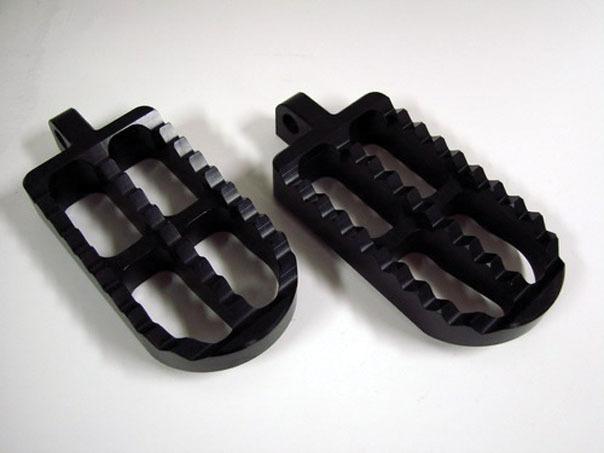 Joker machine standard long profile serrated footpegs black anodized for harley