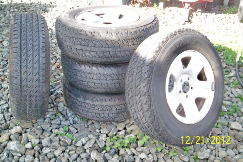 5 firestone tires, 235/70/16 , 16x7j 104 m+s a/t no rims.