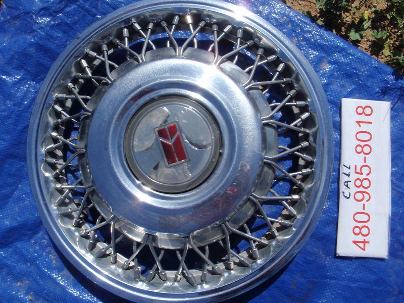 86 87 88 oldsmobile delta 88 hubcap wheel cover 22531288 used oem 14" rim cap