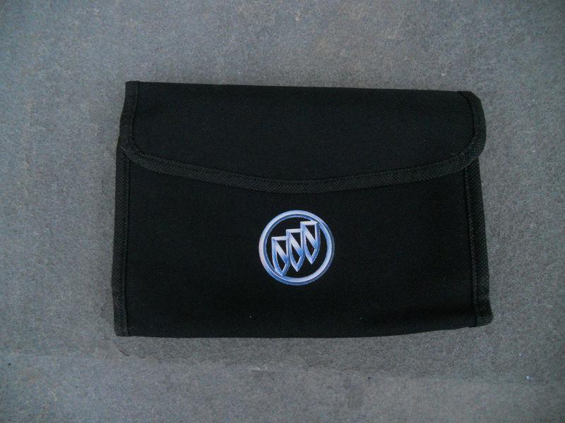 Buick owners manual case cover with colored tri-shield logo embossed on front