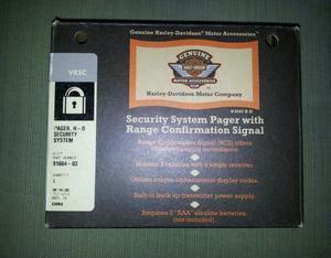 Security system pager with range confirmation signal