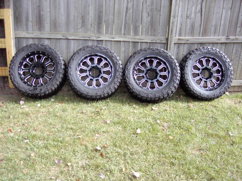 Chevrolet 2500 hd xd series bomb wheels and tires 20x9 8x180