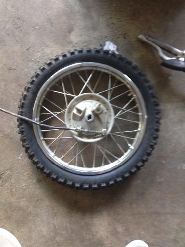 Crf70 complete front wheel with cable