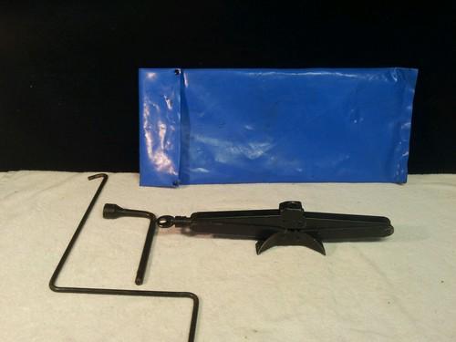 1975-1981oem  tryumph tr7/8  30th anniv edition spare tire jack/ tools/case .