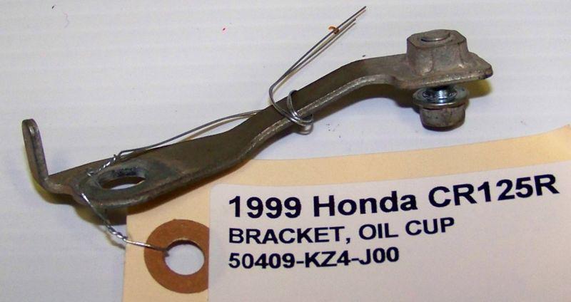 1999 honda cr125r bracket, oil cup 50409-kz4-j00