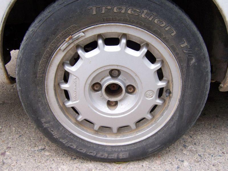 Set of 4 alloy wheels oem vw volkswagen " bottle caps " 4x100 14 in